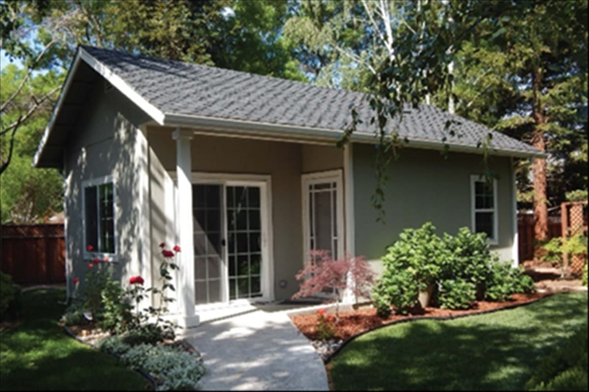 Traditional craftsman-style Hillstar-built ADU with French doors and garden — completed estate project