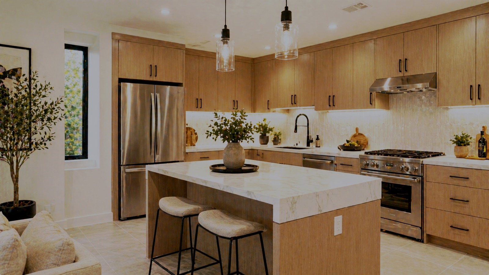 Modern Los Angeles kitchen with marble island and natural light