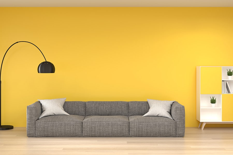 Bold accent wall color in a modern living room painted by Hillstar Construction