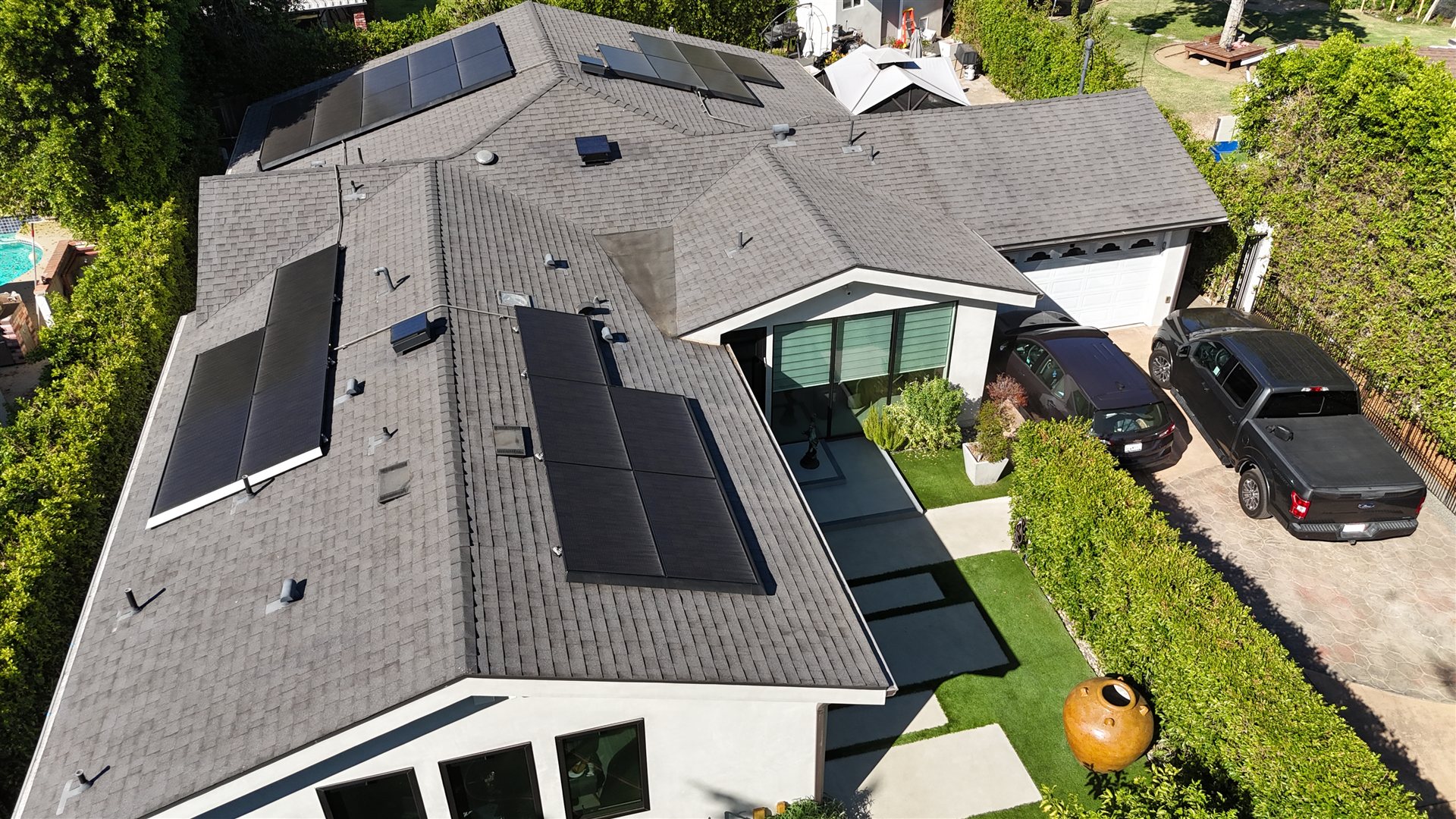 Aerial drone view of residential roof inspection by Hillstar Construction in Los Angeles