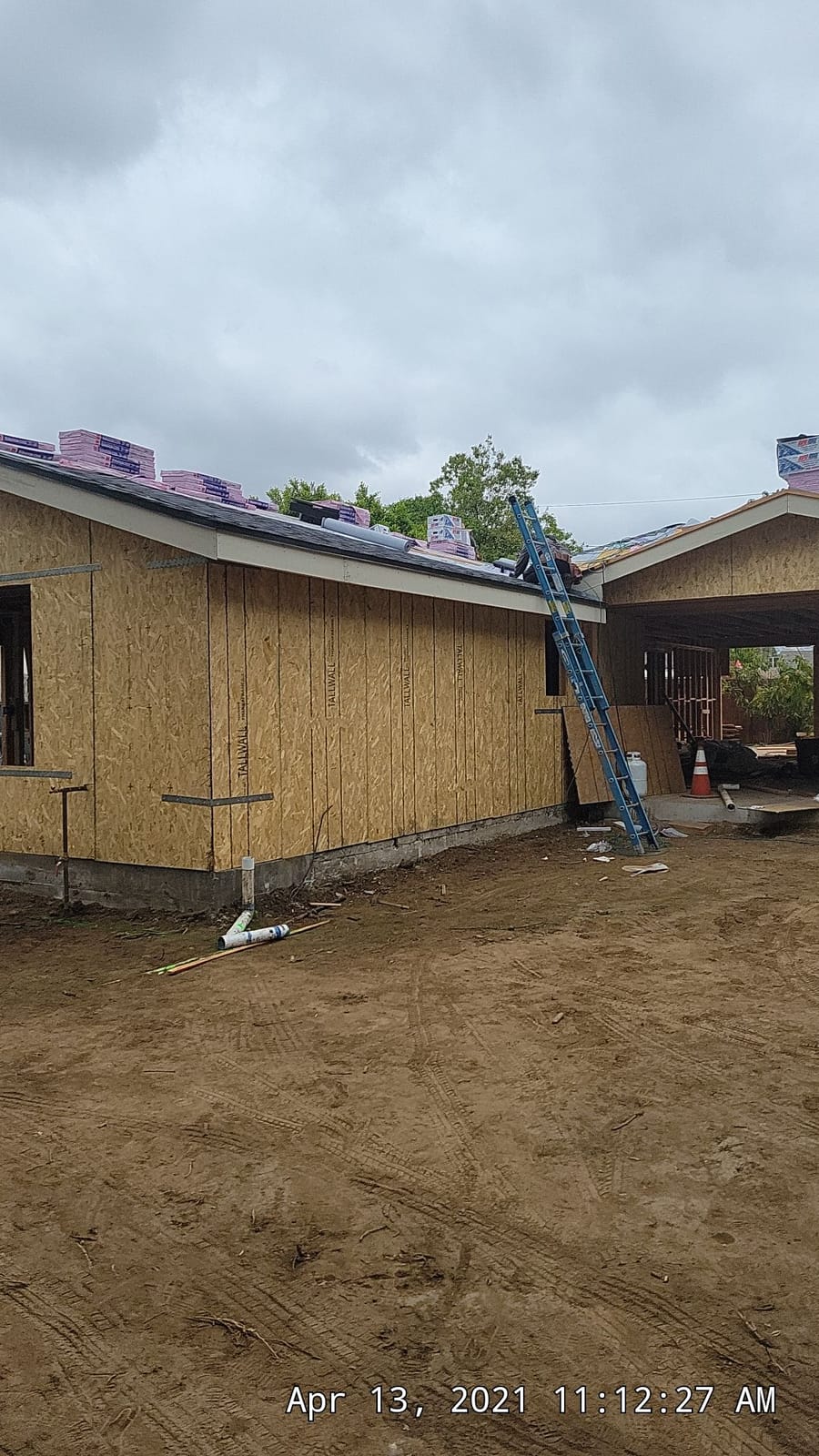 Exterior of a Hillstar Construction Inc conversion project at the framing and roofing stage