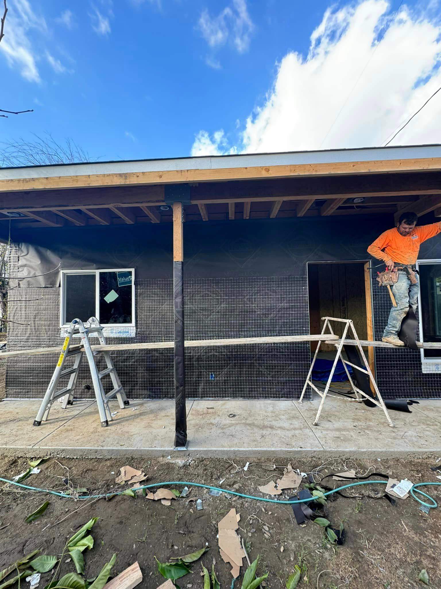 Stucco lath and netting preparation before scratch coat by Hillstar Construction